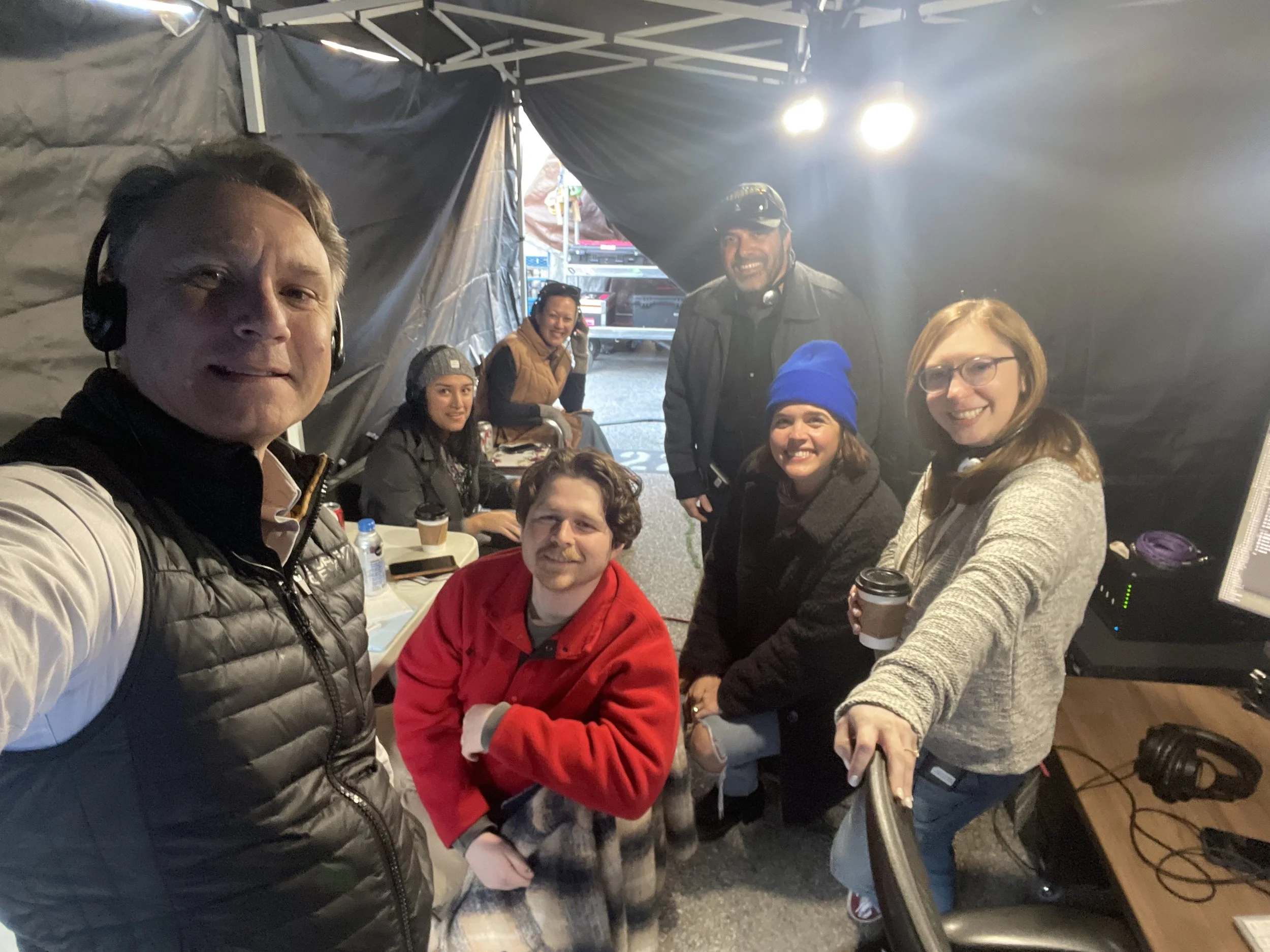 Post Production Team takes a photo on set