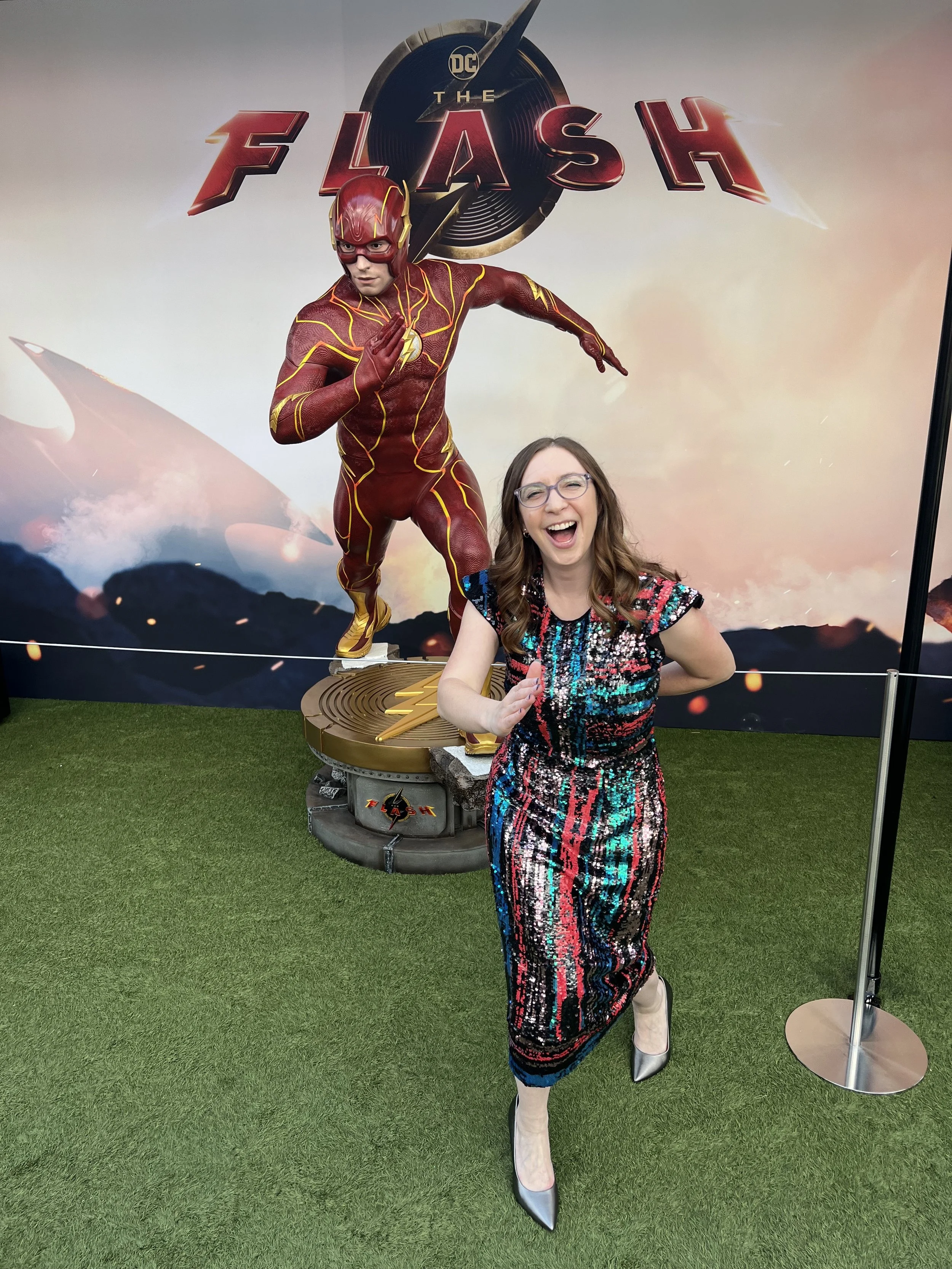 Esther Sokolow poses with Flash statue