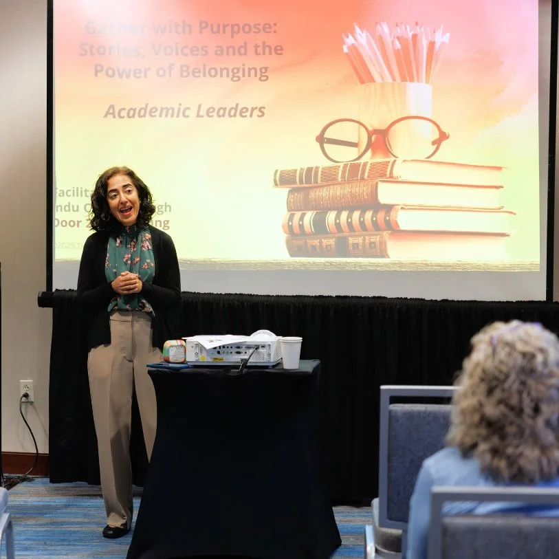 Indu Singh presenting to a group of faculty and leaders