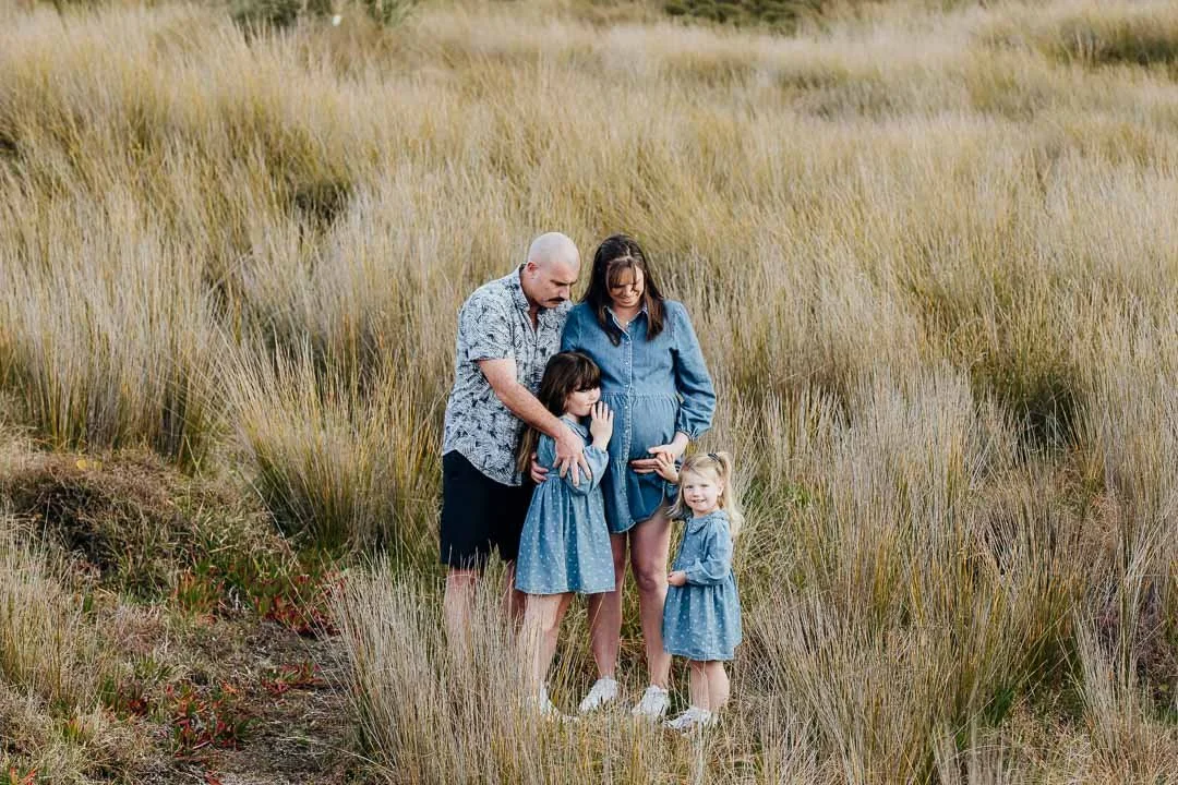 Family photo in the Dunes Papamoa Beach