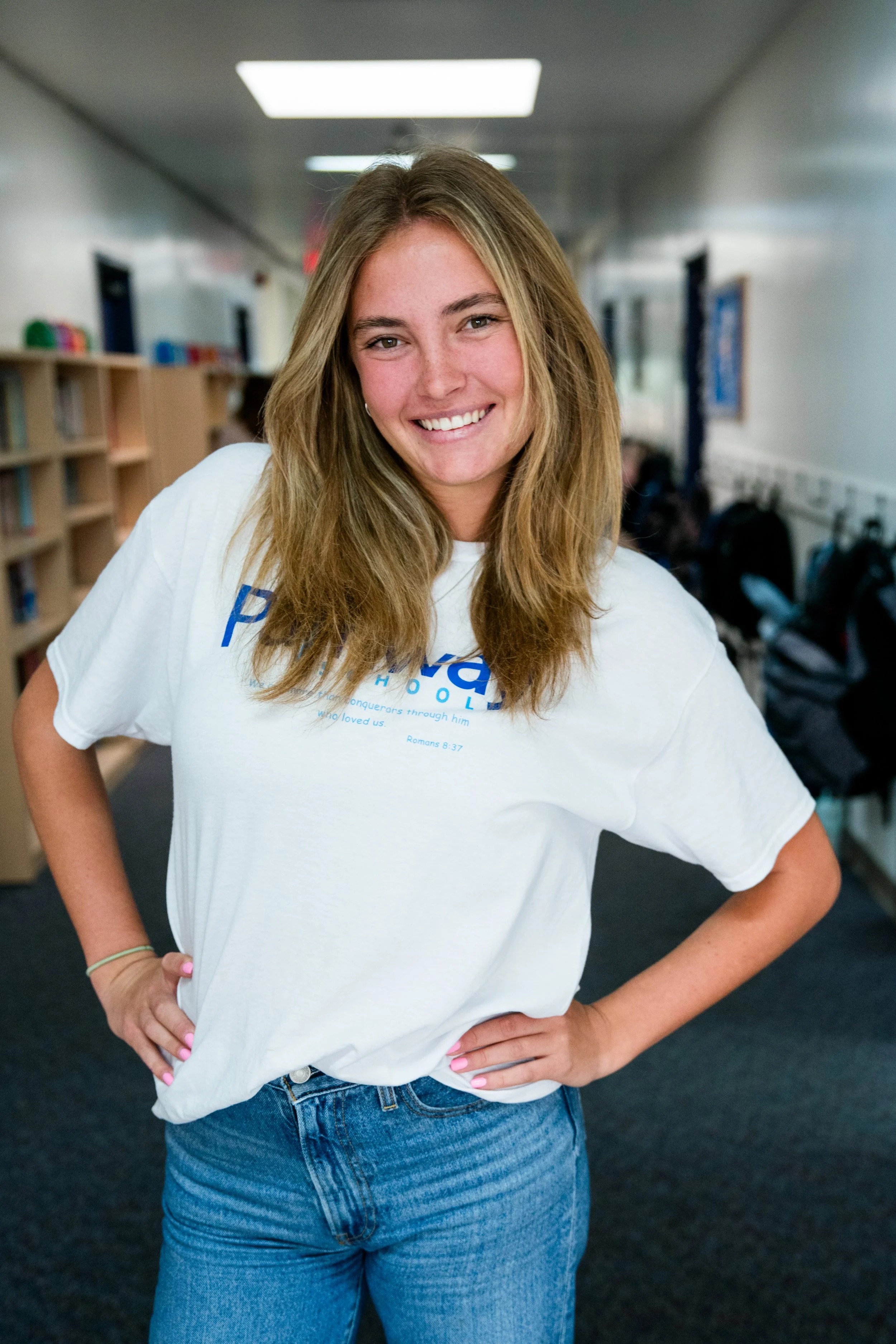 Blue sign with white text that reads "Pathway Staff", decorated with yellow curved lines at the top right and bottom left corners.