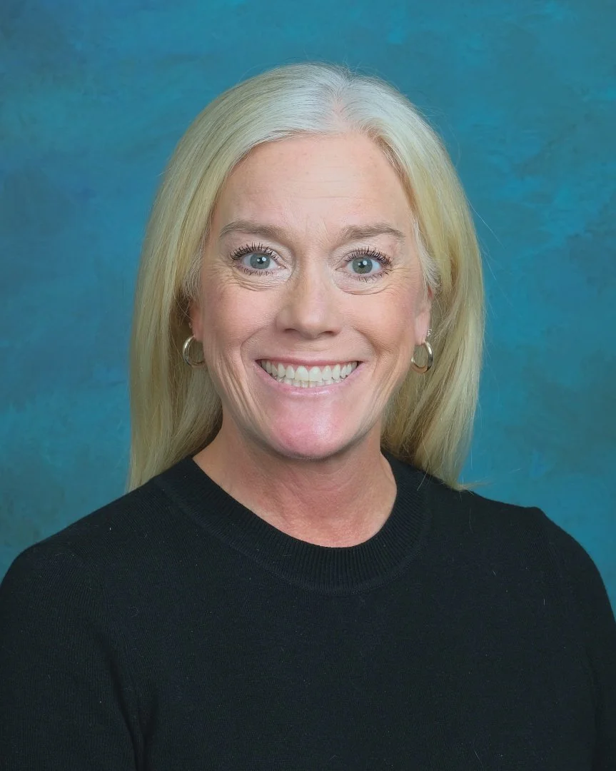 Blue sign with yellow circular accents, displaying the words 'Pathway Staff' in white text.