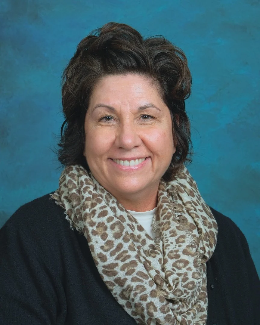 Blue sign with white text that says "Pathway Staff" and yellow curved lines in the corners.