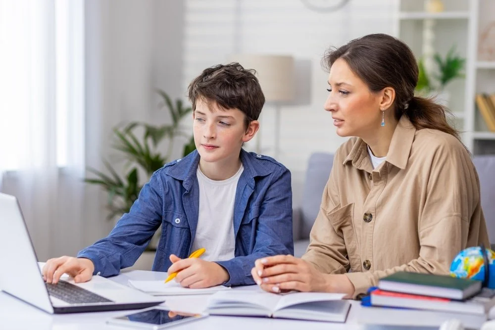 Teacher teaching a student in a special education school in Laguna Hills CA