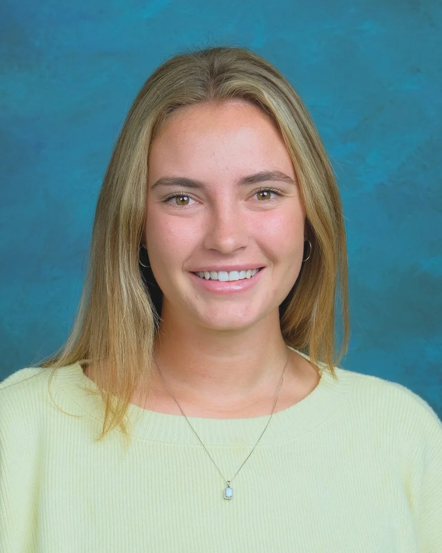 Blue sign with white text that reads "Pathway Staff", decorated with yellow curved lines at the top right and bottom left corners.