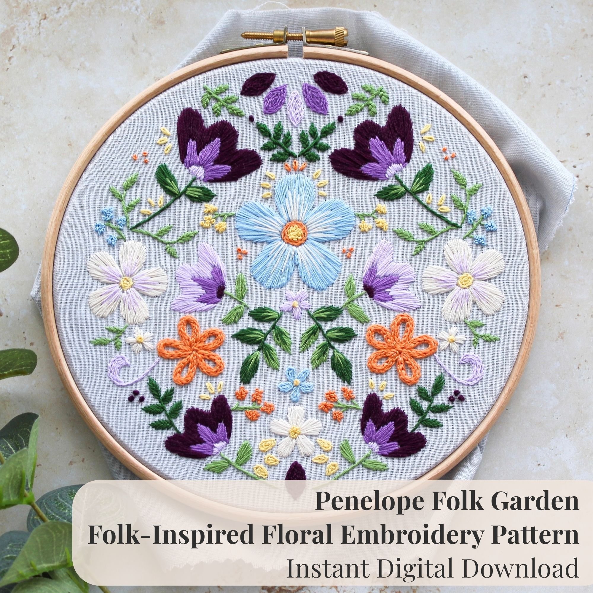Penelope Folk Garden floral embroidery pattern PDF shown in 7 inch hoop – beginner friendly folk inspired hand embroidery design.