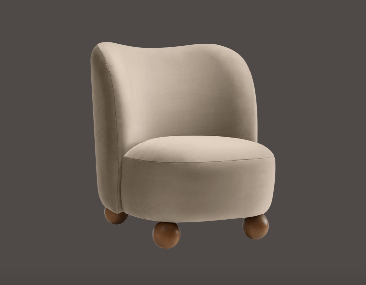 A beige upholstered armchair with rounded wooden legs on a gray background.