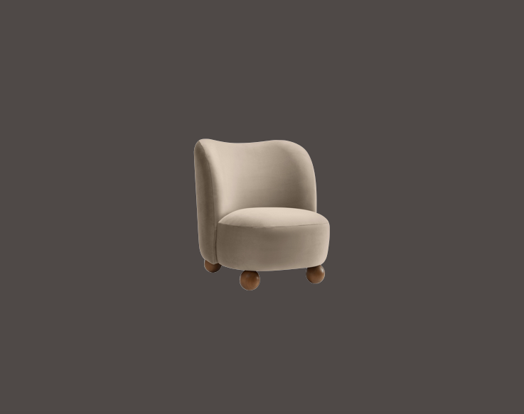 A beige upholstered armchair with rounded back and wooden legs, set against a gray background.