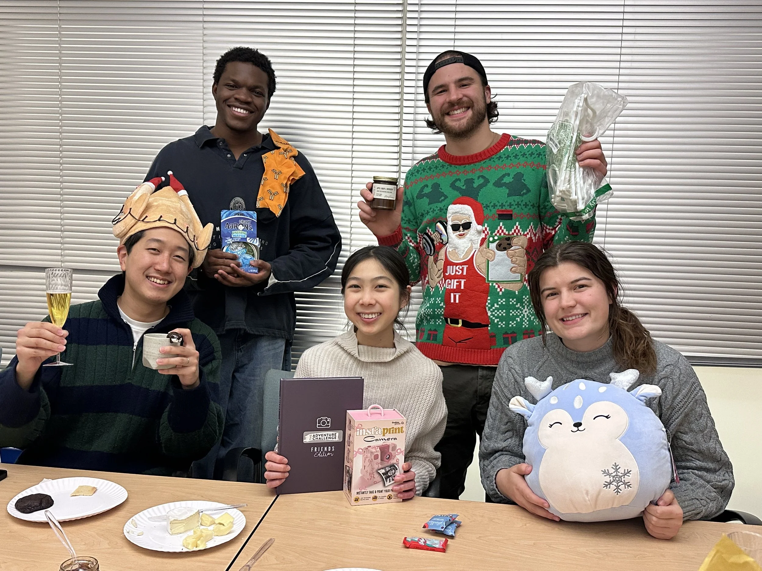 Dec 16, 2025 - The festivities continue with our annual white elephant gift exchange (6/6).