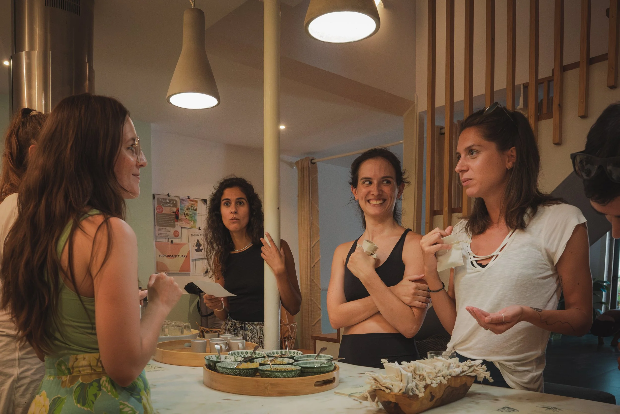 Copy of Kitchen group of women around counter.jpg