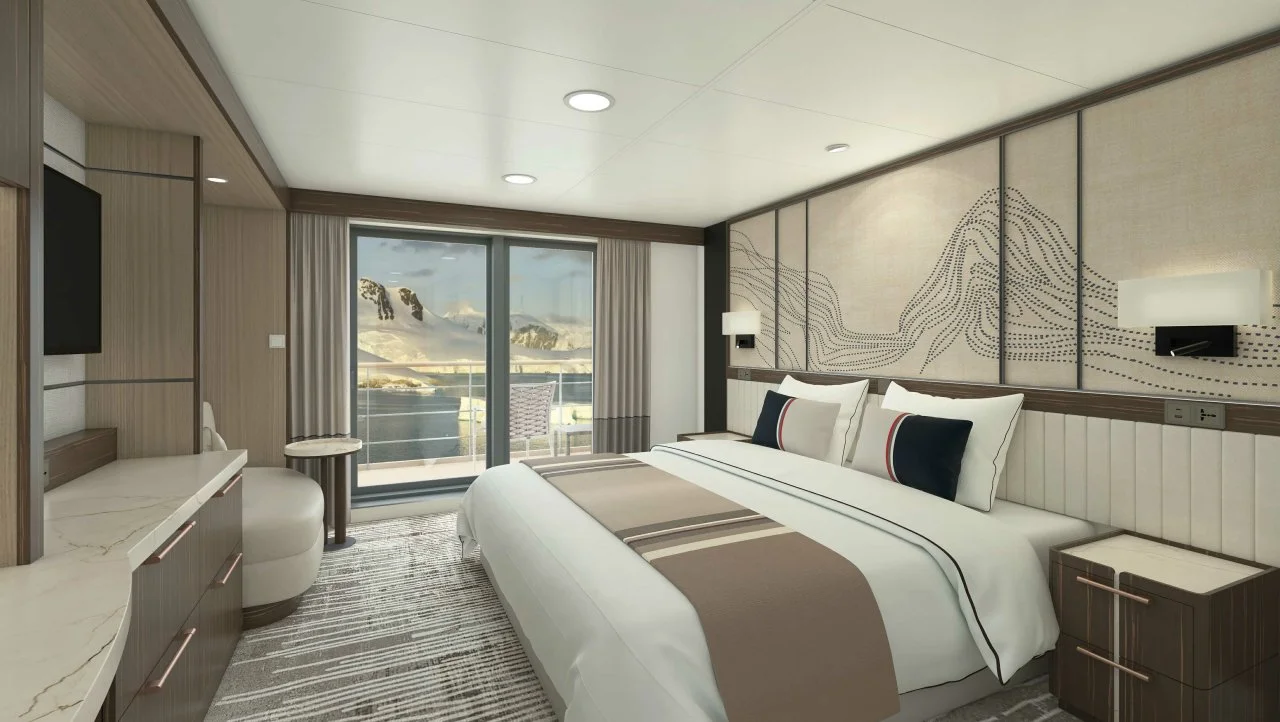 Interior of Veranda Cabin on Magellan Discoverer with sliding glass doors to balcony and glacier views