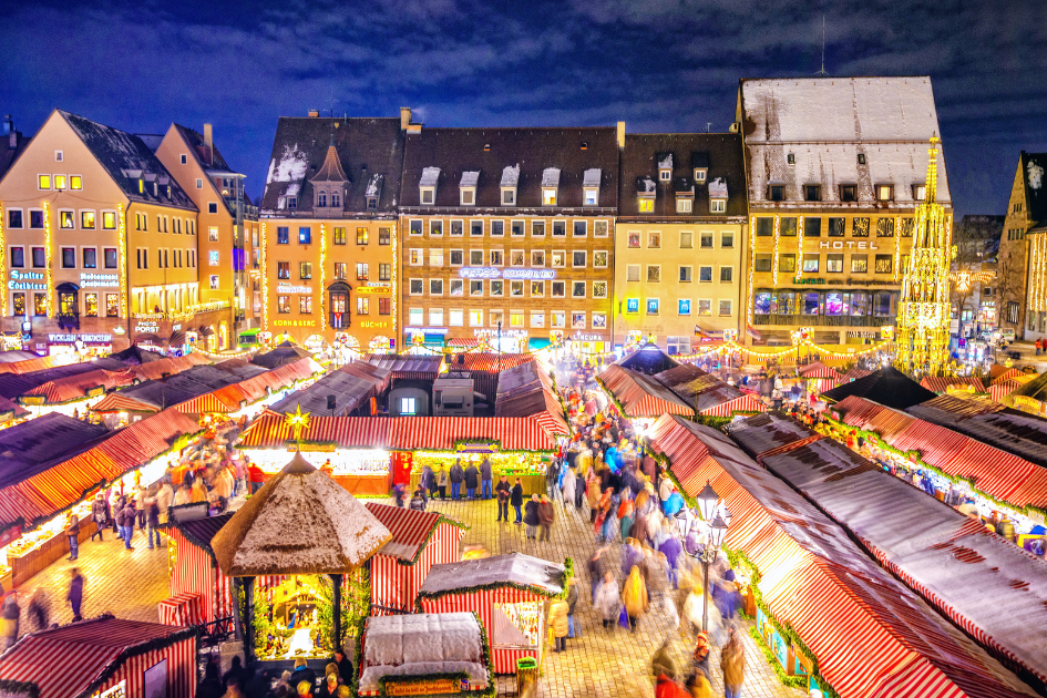 Christmas lights at the markets light up the dark sky