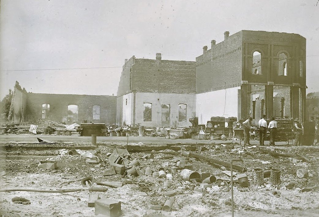 What remains of a brick building on S. Bridge Street after the 7-18-1913 fire. Fifty (50) buildings were destroyed. There was very little insurance to help with damages.