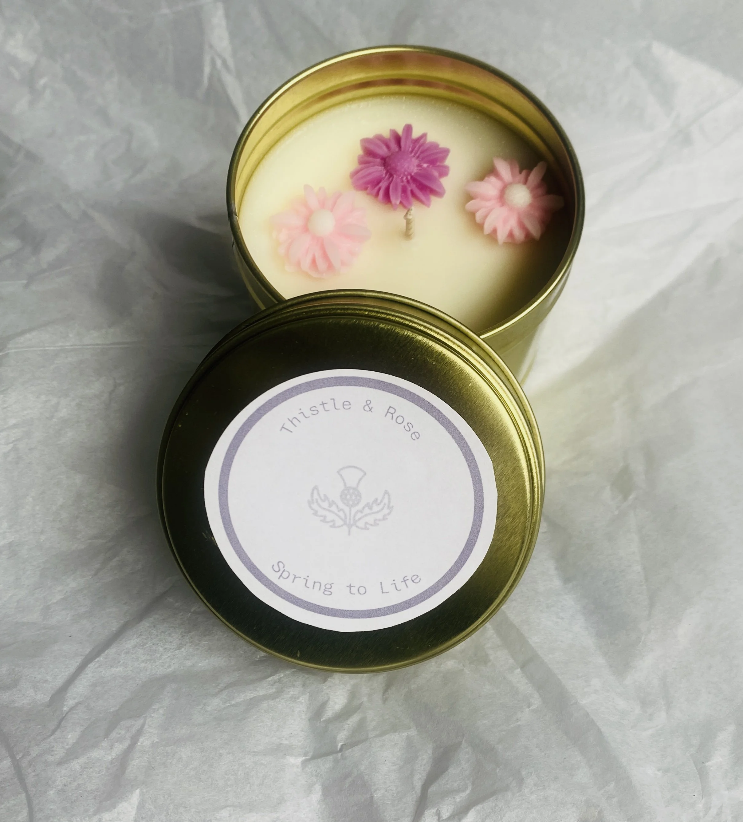 Spring to life candle tin