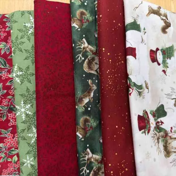 Five Christmas fabric prints