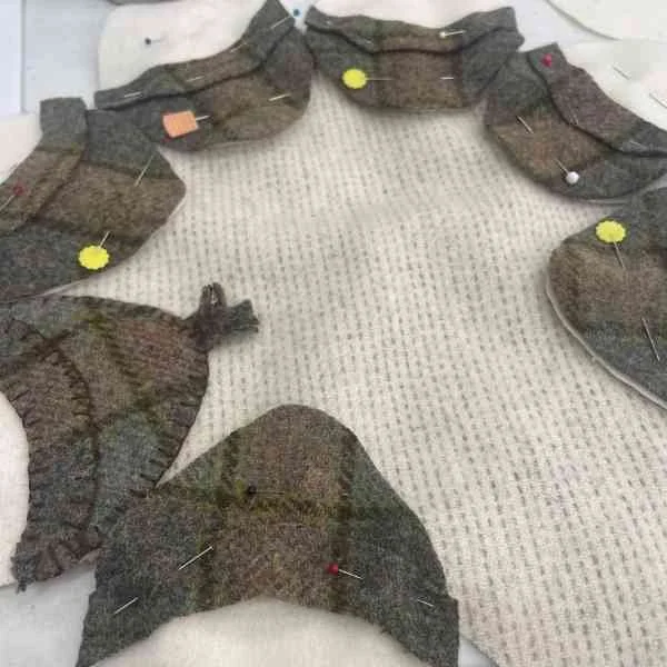 Wool appliqué candle mat