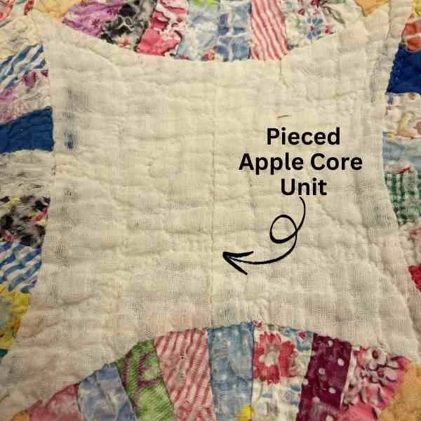 Pieced apple core unit on Antique Quilt Double Wedding Ring