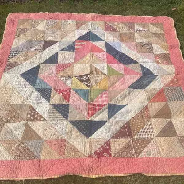 Full Quilt. Pink Border. Beige. Blue