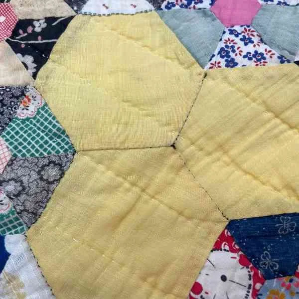 Hexagon Star Quilt Repair Black Thread.jpg
