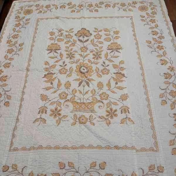 Antique cross stitch quilt
