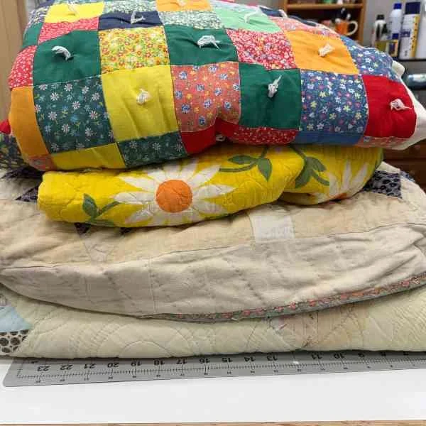 Stack of Old Quilts