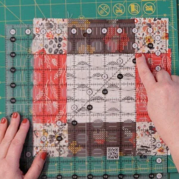 Step one of showing how to squaring up a block with a square ruler