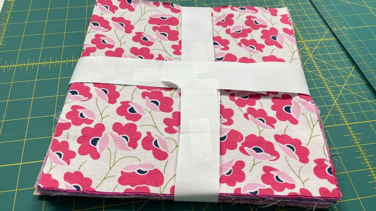 Scrap layer cake squares finished with ribbon