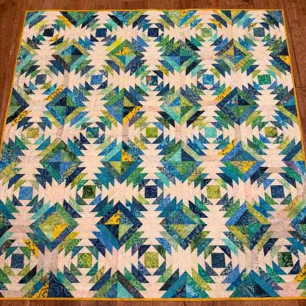 blue and green pineapple block quilt