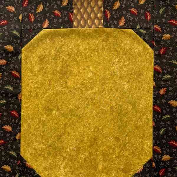 Brown Background Pumpkin Quilt block.jpg