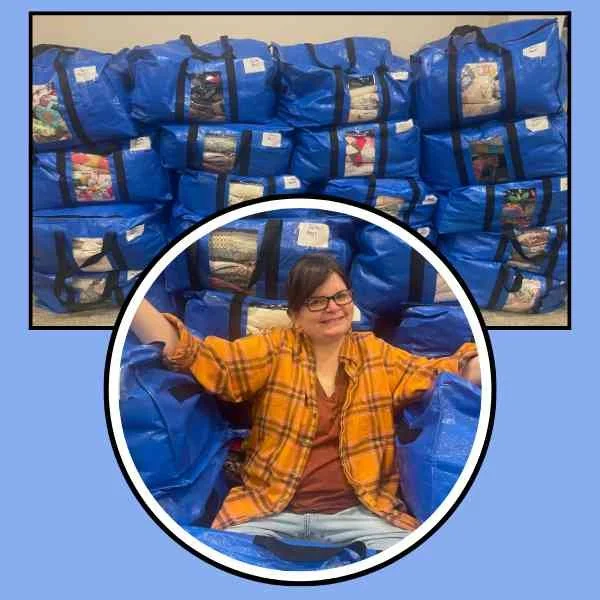 I am sitting with a stack of 17 big bags of quilts that hold about 200 quilts. They are stacked in the back and there is a picture of me in the front.