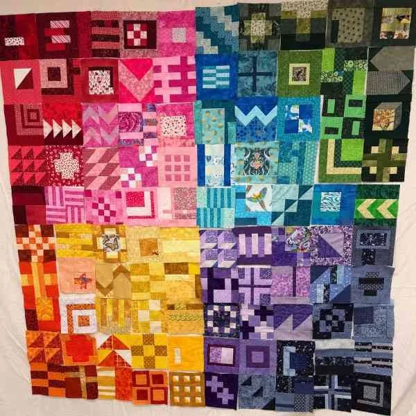 100 Modern Quilt Blocks all together on design wall