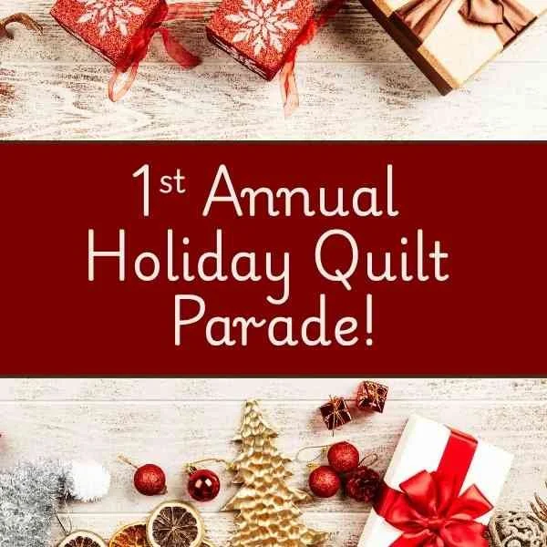 Banner that says "1st annual holiday quilt parade" on it.