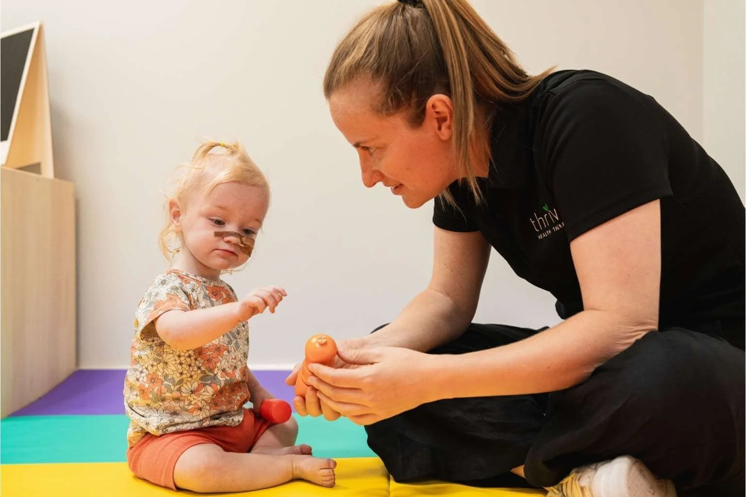 Speech therapist and child during session at Findon clinic