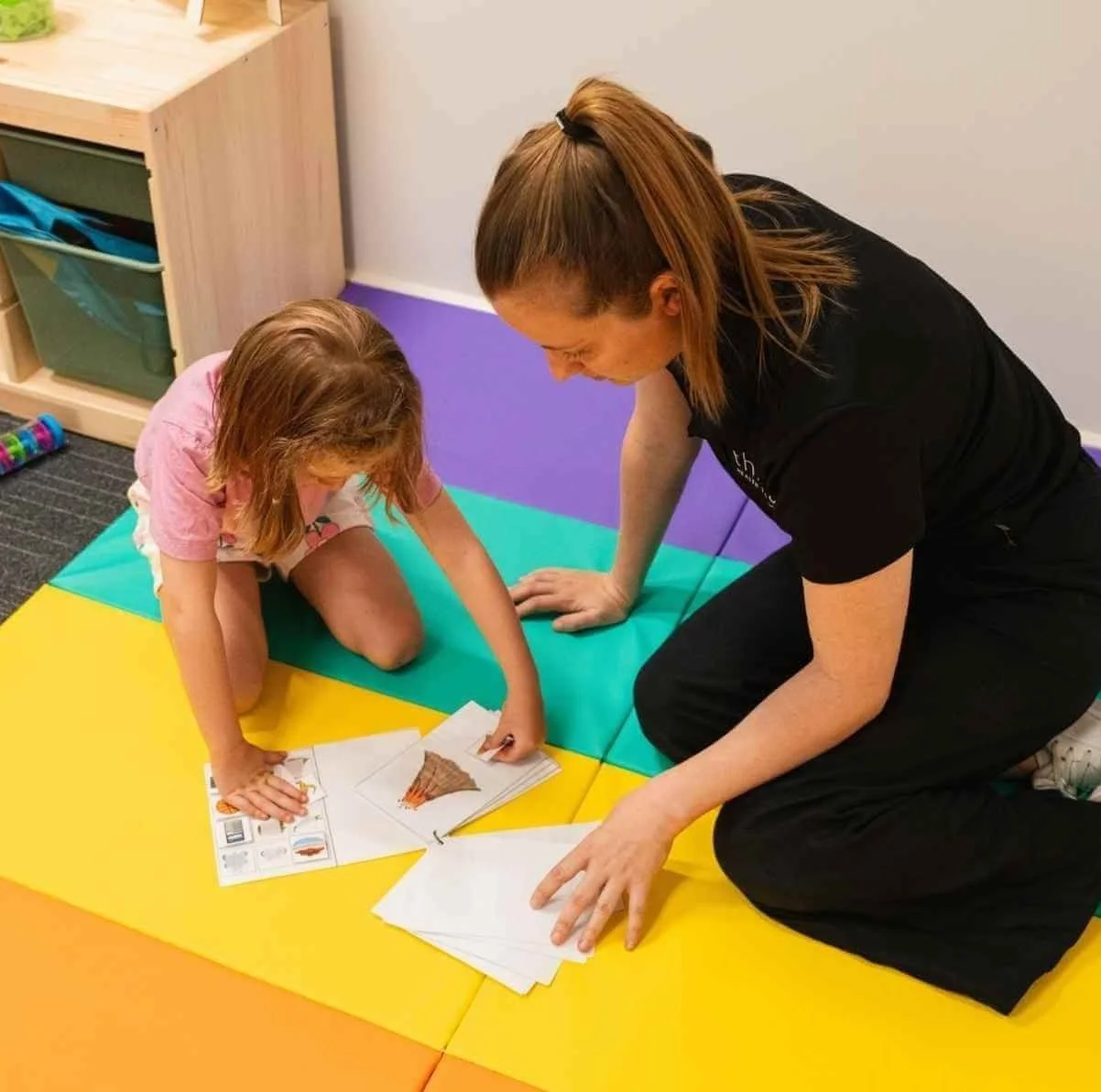 Speech pathologist and child during an assessment at Adelaide clinic