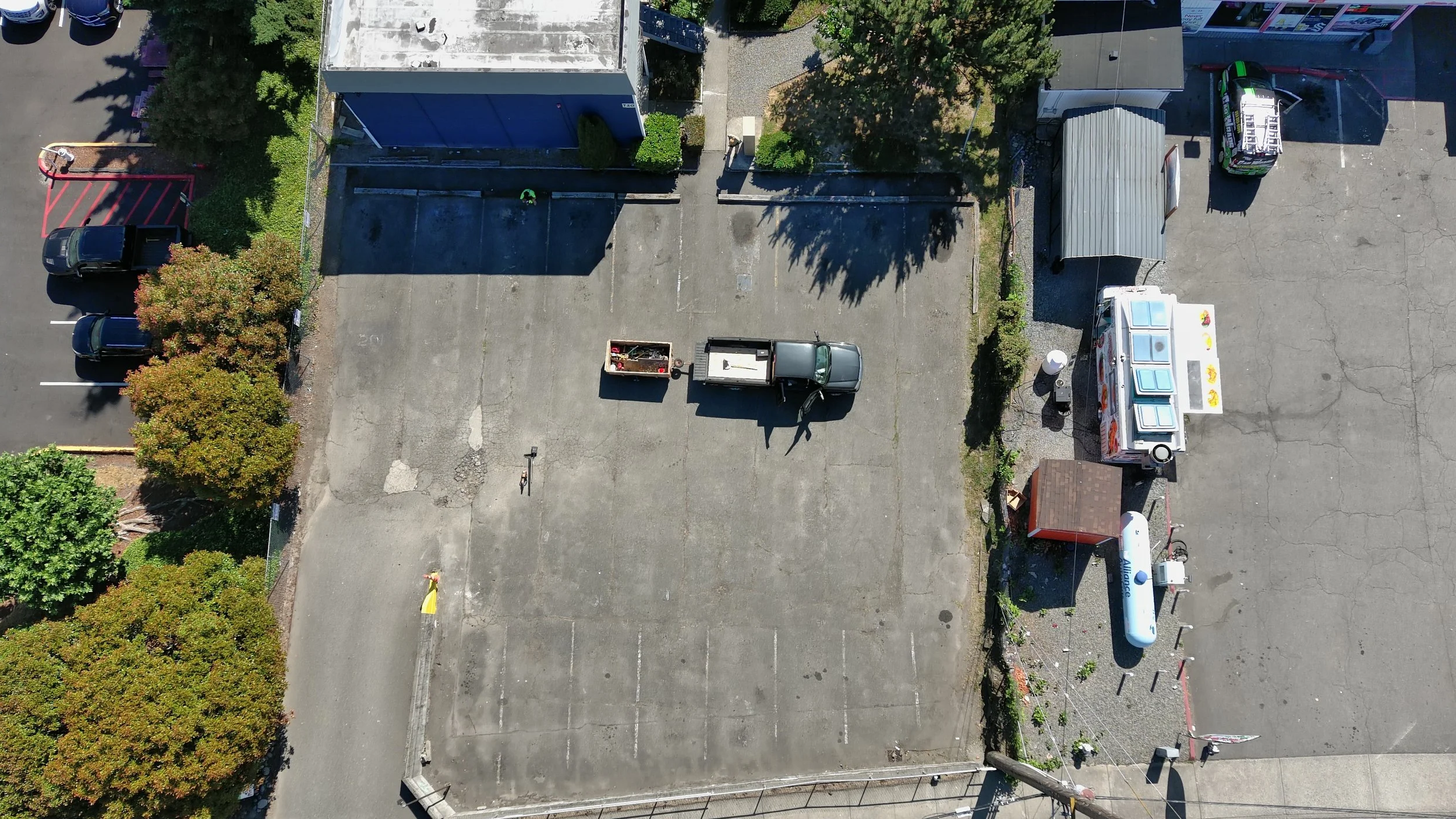 We start every project with a thorough cleanup of the parking lot. This includes removing debris from cracks (if crack filling is required), clearing leaves, picking up trash and litter, leaf blowing, and sweeping the entire surface to ensure it's pr