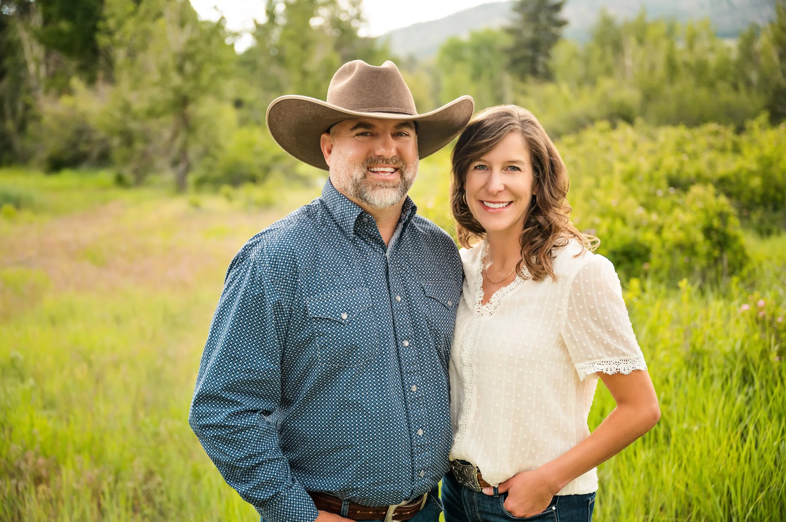A cowboy and his wife smile for Lemaire Photography in Verdi, NV