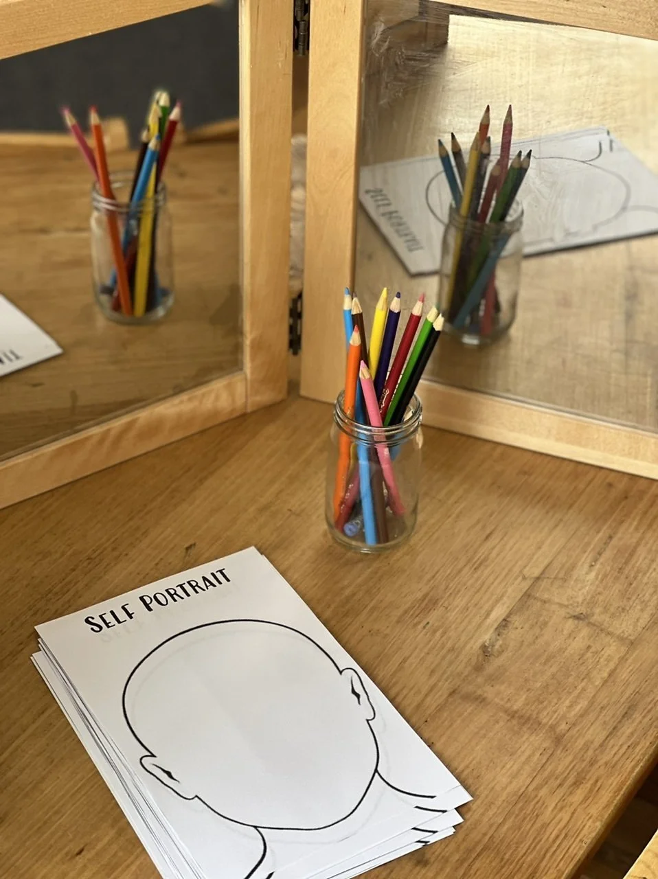 Draw yourself activity at Scotts Road Child Care Centre.jpeg