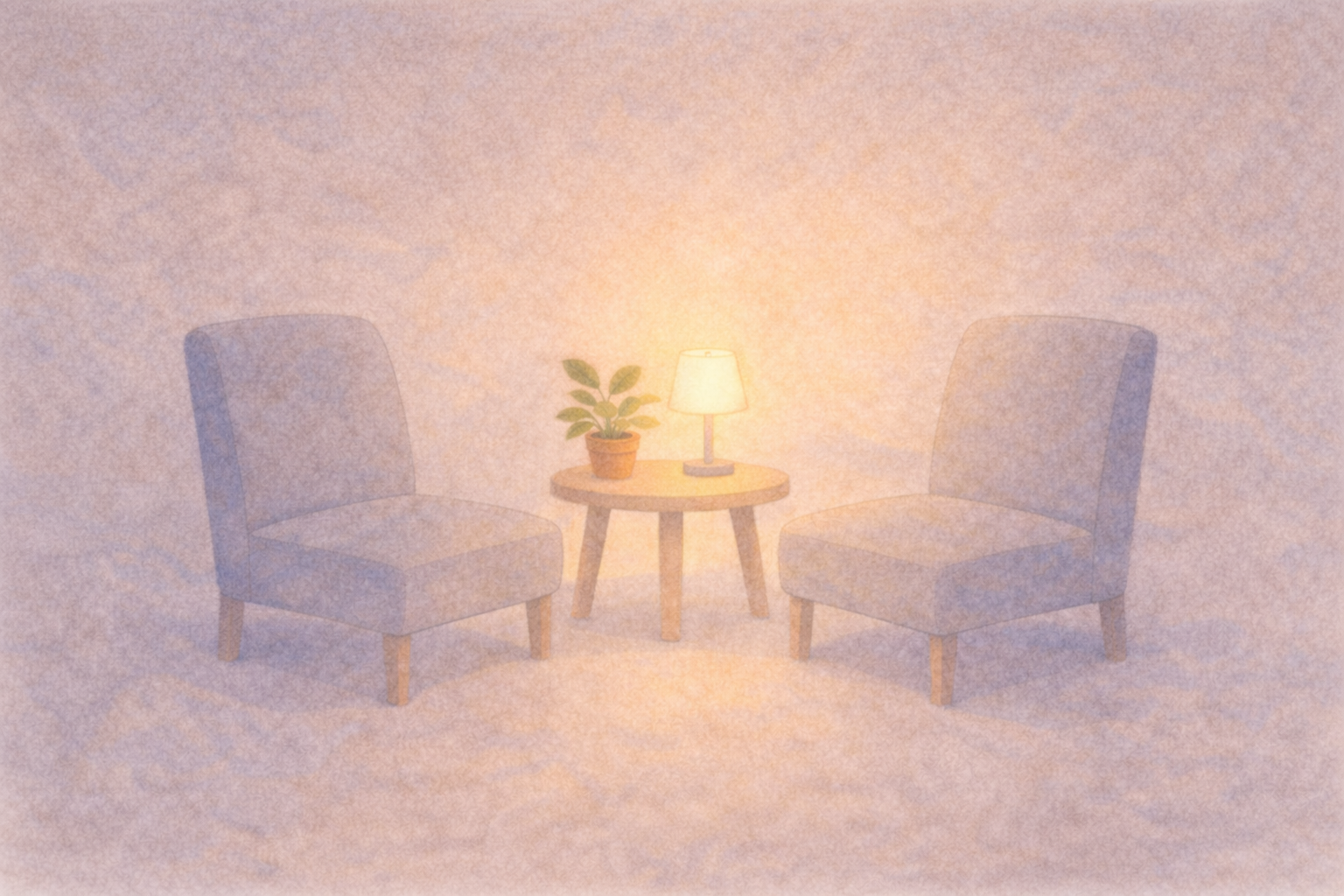 Two comfortable chairs facing each other in a calm, welcoming space.