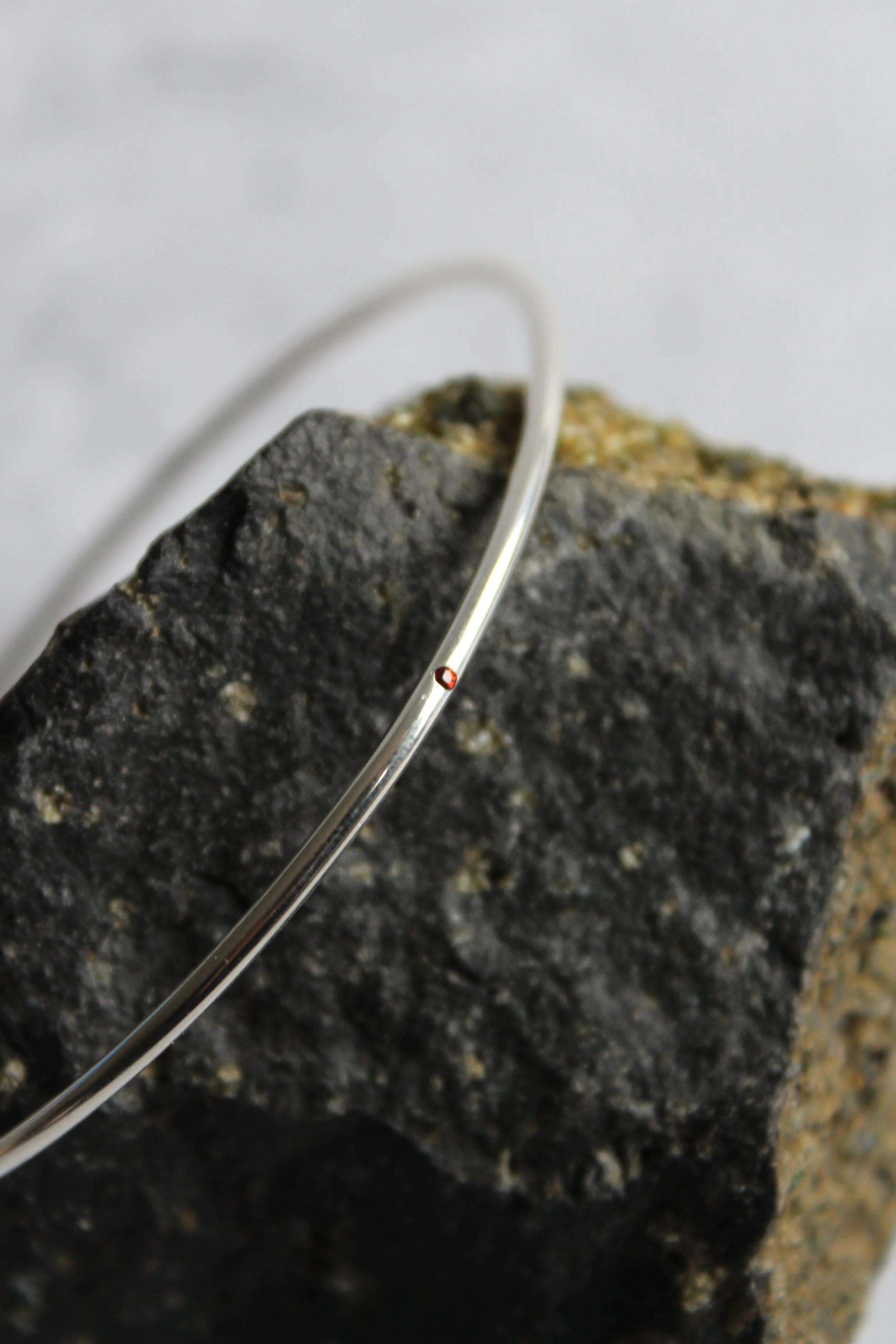 Silver Bangle Forged Orange.JPG