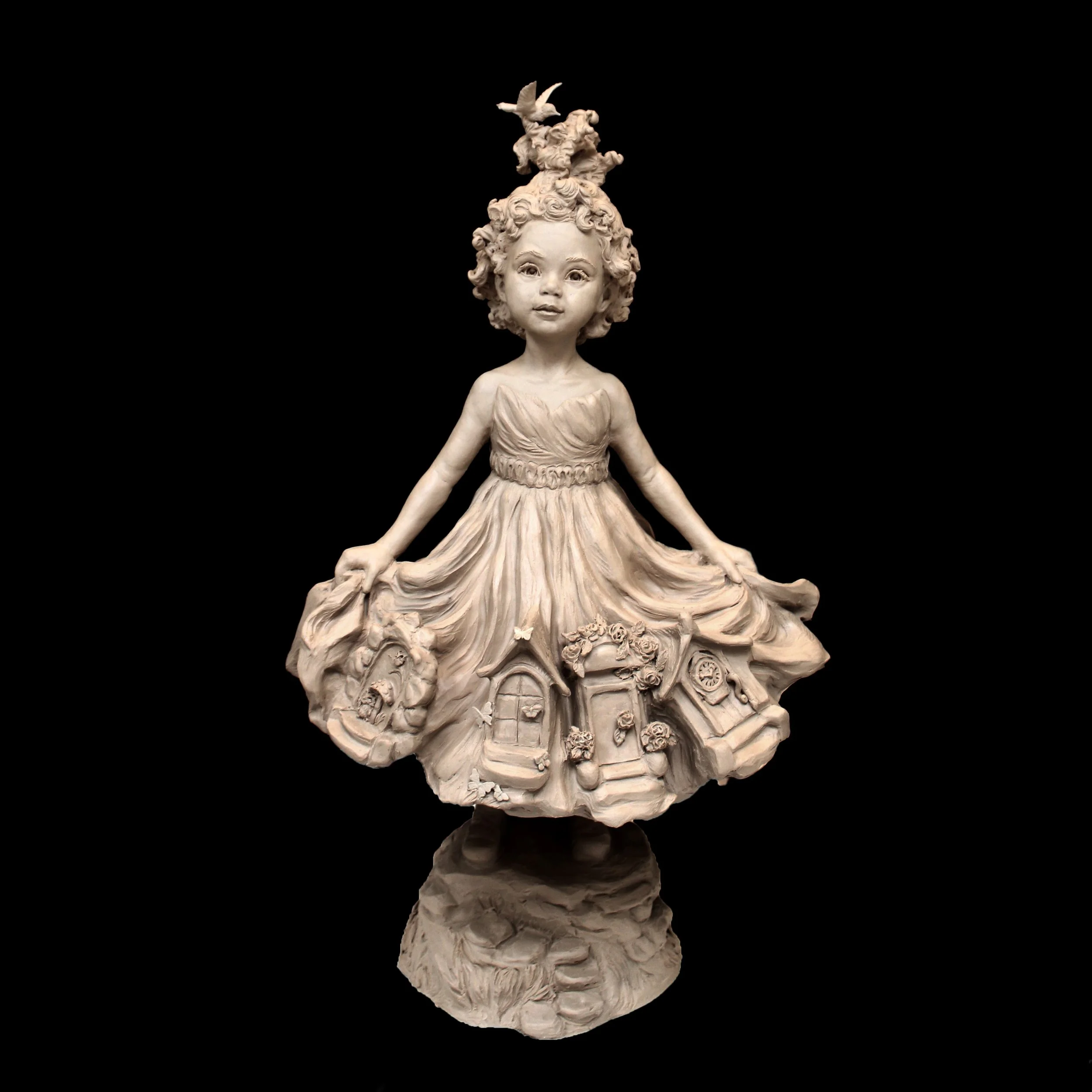 Sculpture of little girl with dress