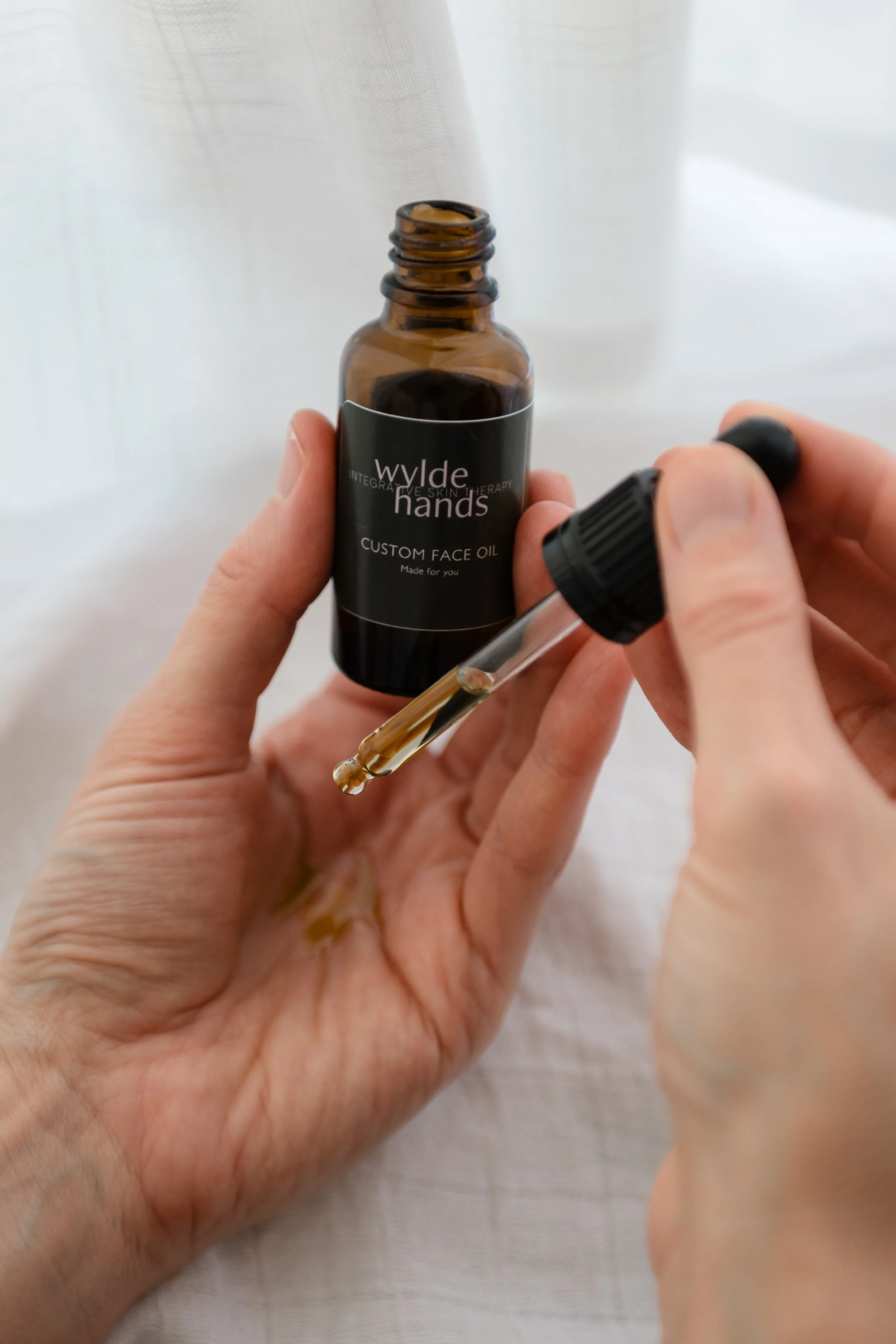 Wylde Hands Custom oil in hands 1.jpg