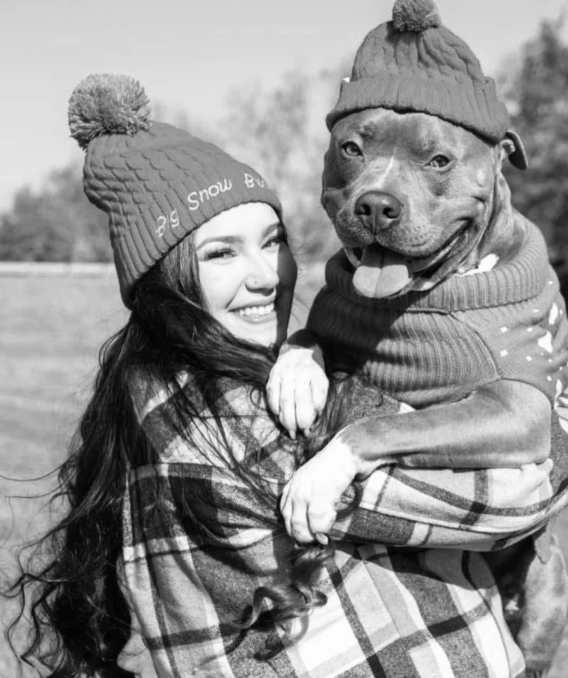 LGBTQ+ piercer KCMO Gremlin Stabs Maya Terrazas with her dog