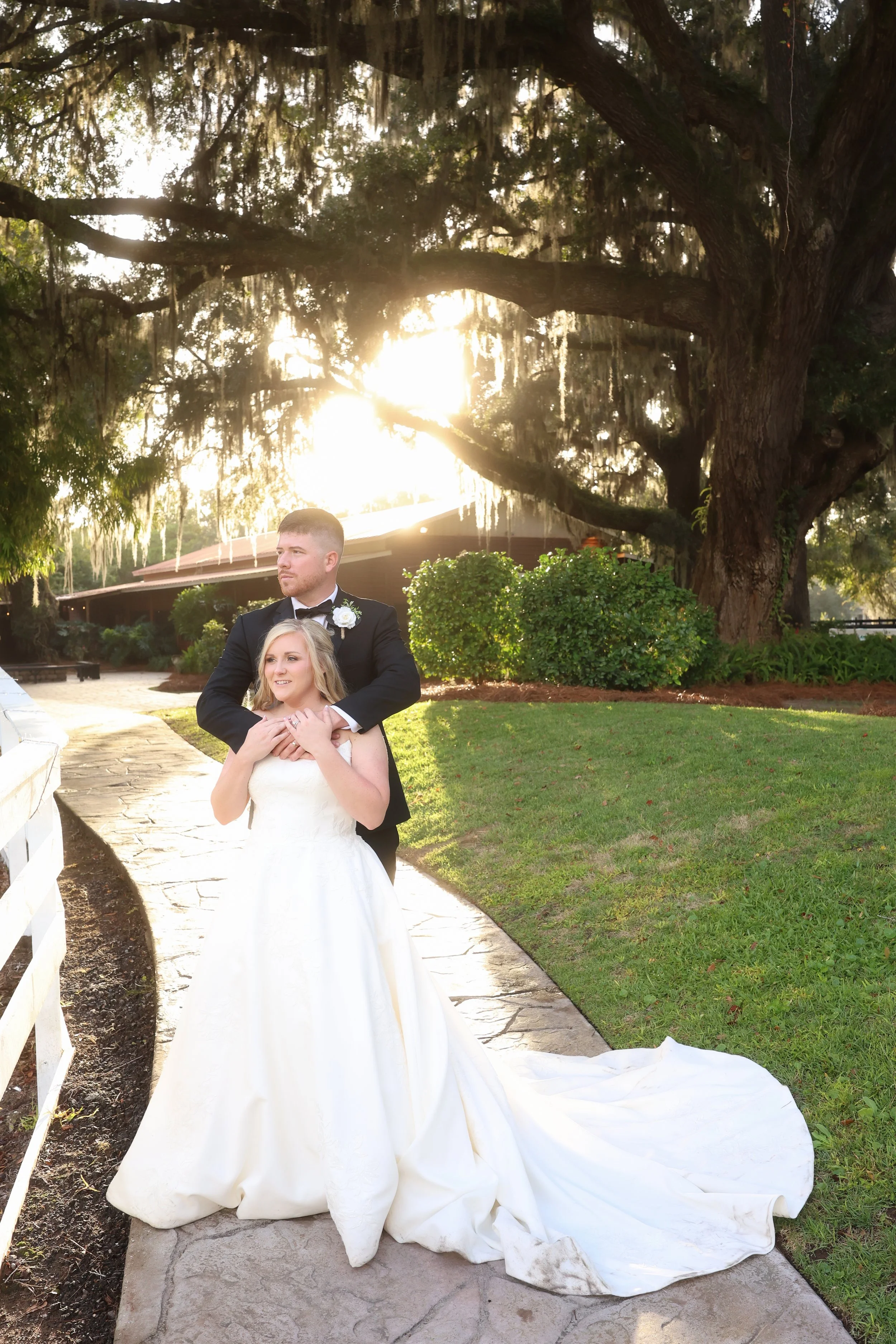 She rests into his embrace, love settling in like something meant to last.