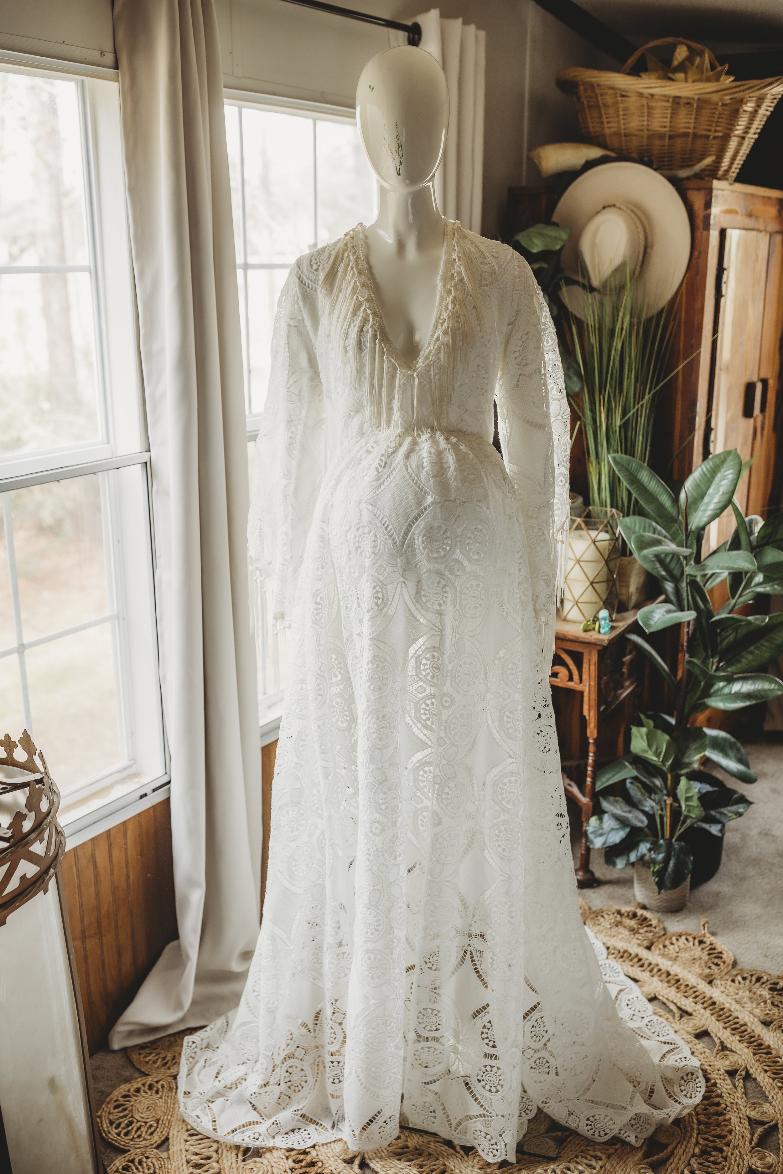 Ivory lace bohemian maxi dress with long sleeves and a flowing silhouette