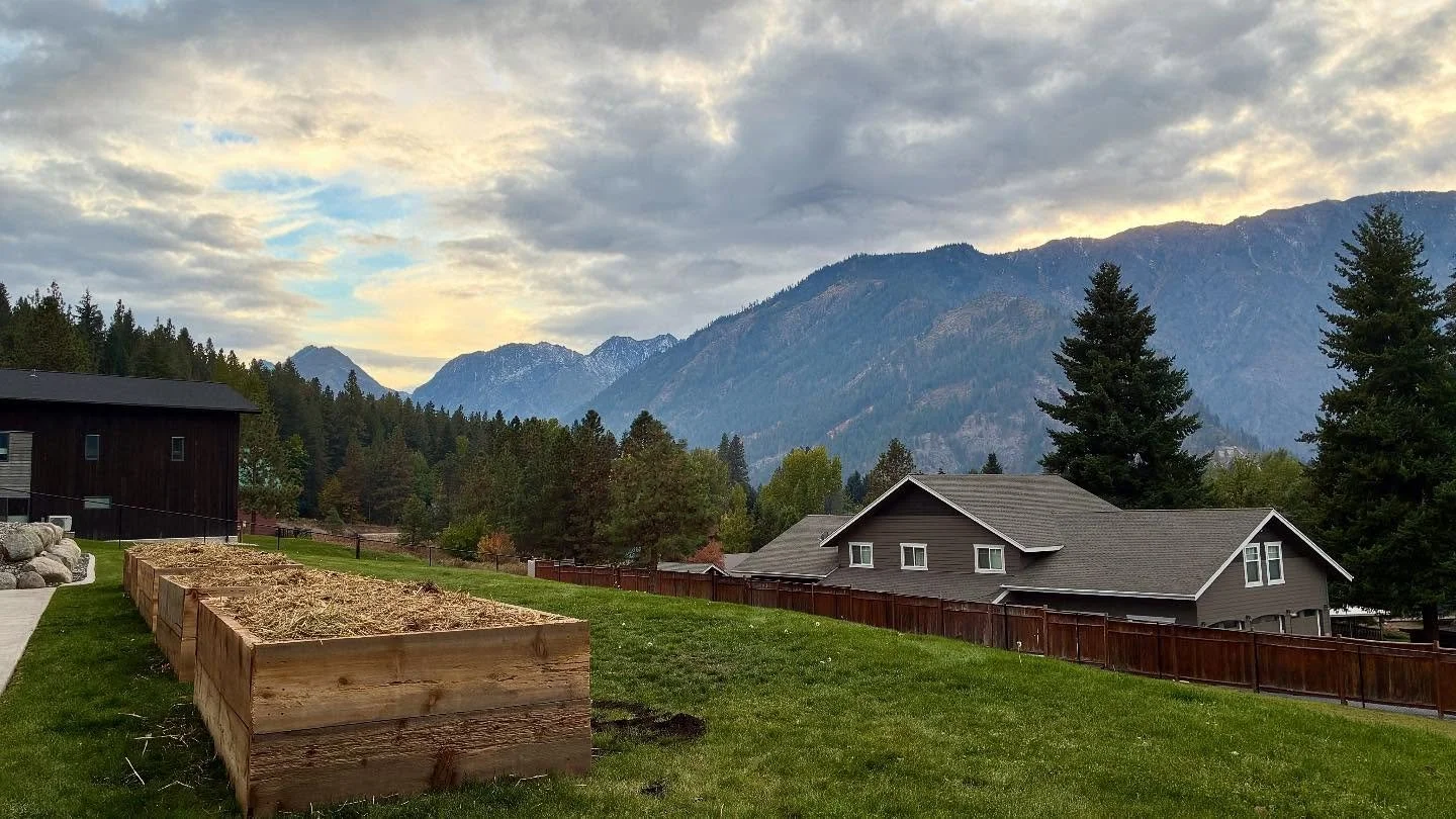 Raised beds with a view! Just finished building these cedar board beds for a client in Leavenworth. Filled the bottom with old punky firewood, the rest with garden soil, and topped with some poopy straw gathered from a local animal sanctuary. The woo