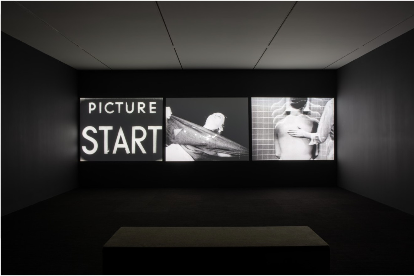 Bruce Conner “Eve-Ray-Forever”. Multi-channel video utilizing three projectors mounted to ceiling.