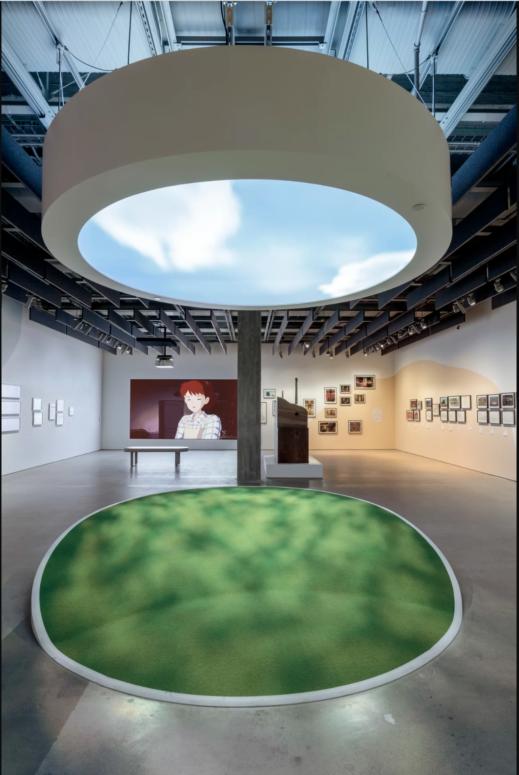 Flight room featuring three single channel projections and projection-mapped sky interactive