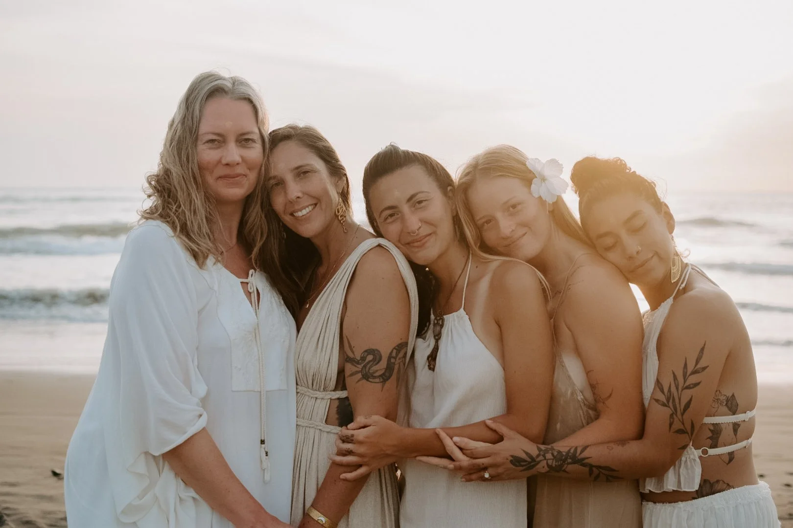 Kundalini Activation Facilitators on the beach, gathering in sisterhood as Priestesses of the light.
