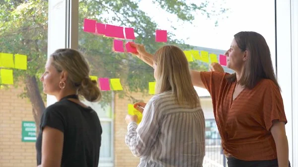 People sticky notes in workshop with Sue Giacobbe and Dan Kuss