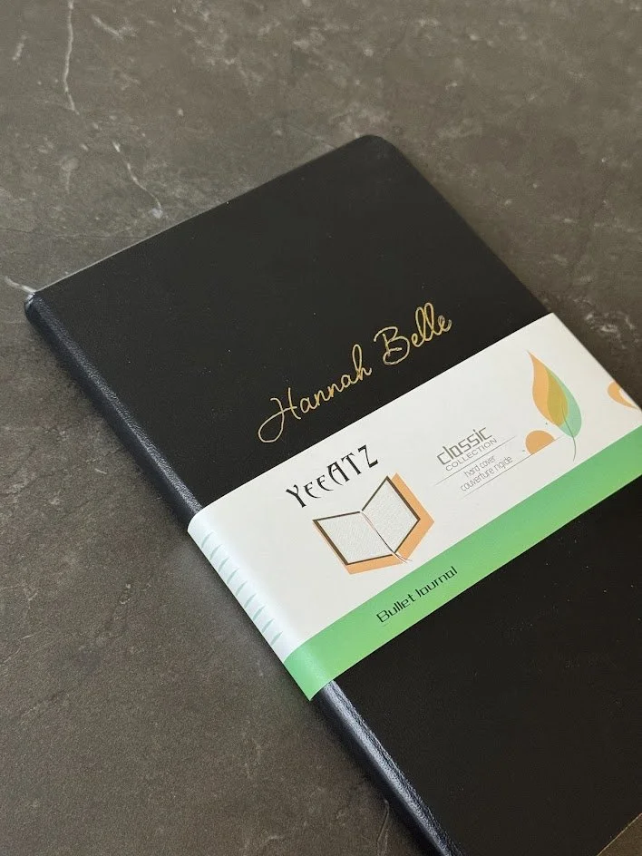 Gold foiled notebook; trade show activation